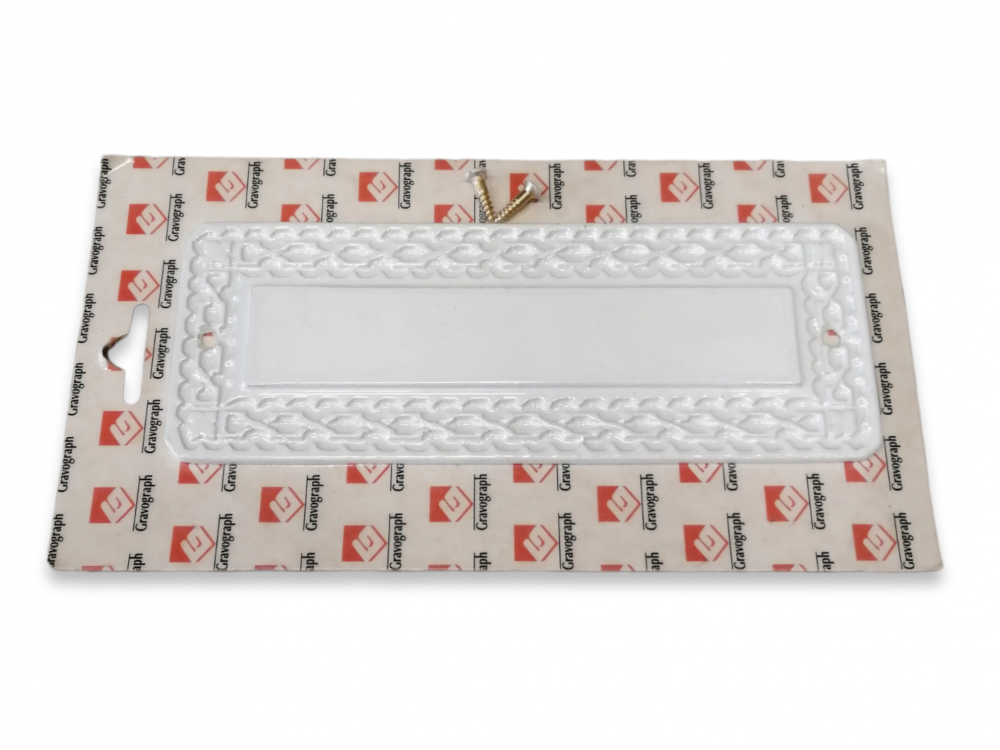 Valkoinen messinkikyltti